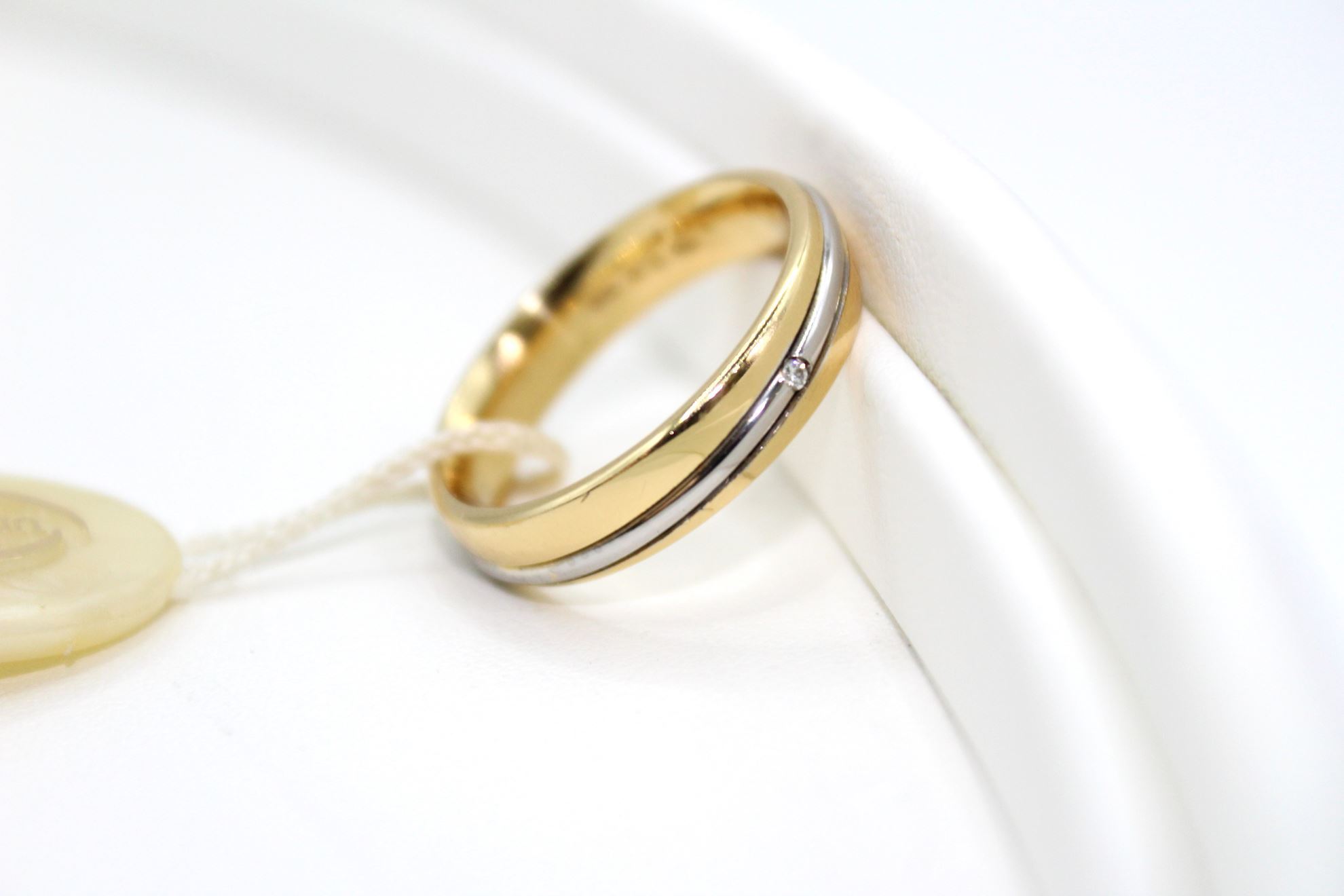 Immagine di Fede UNOAERRE modello Saturno in Oro Giallo e Bianco con Diamante