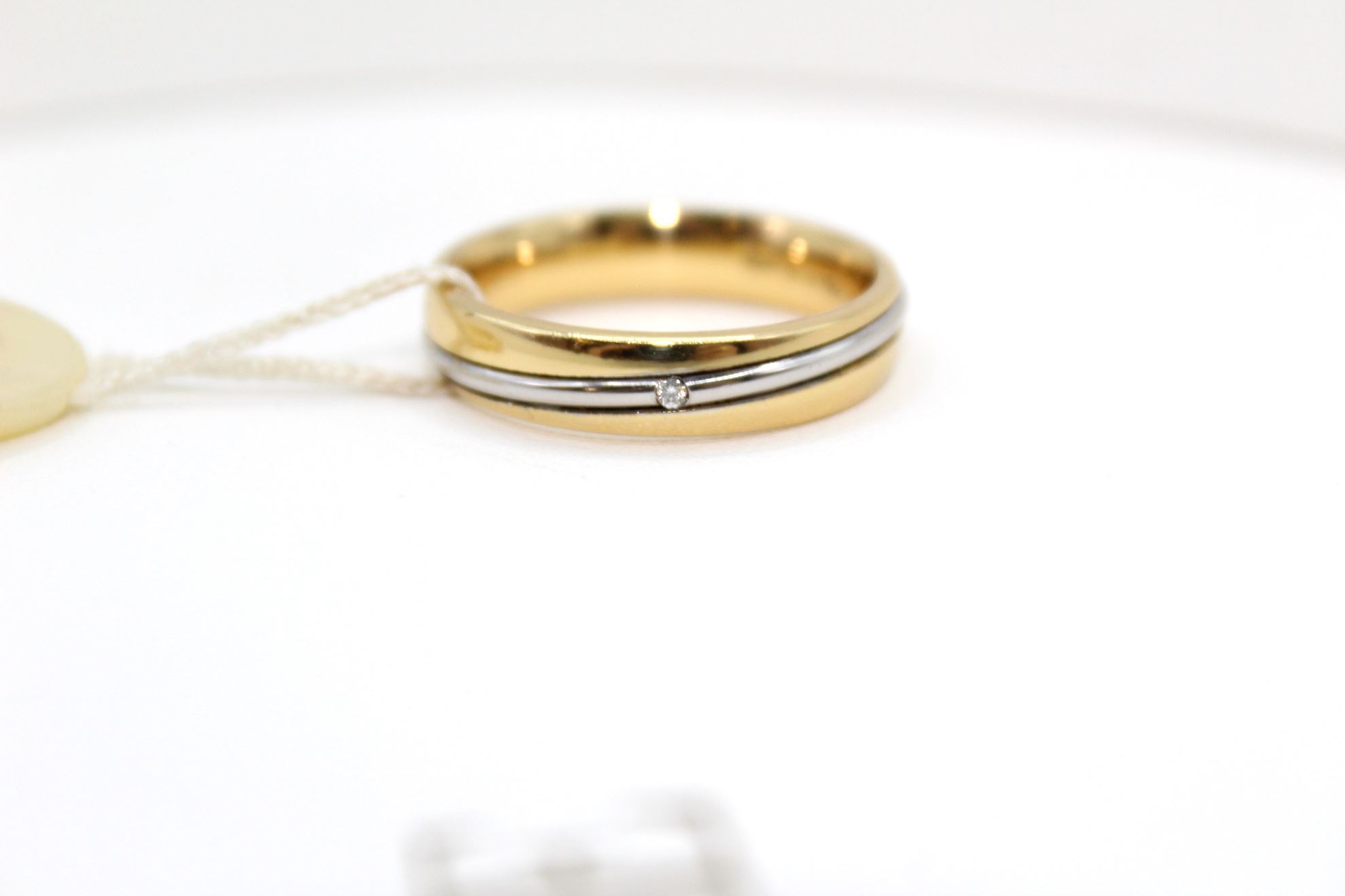 Immagine di Fede UNOAERRE modello Saturno in Oro Giallo e Bianco con Diamante