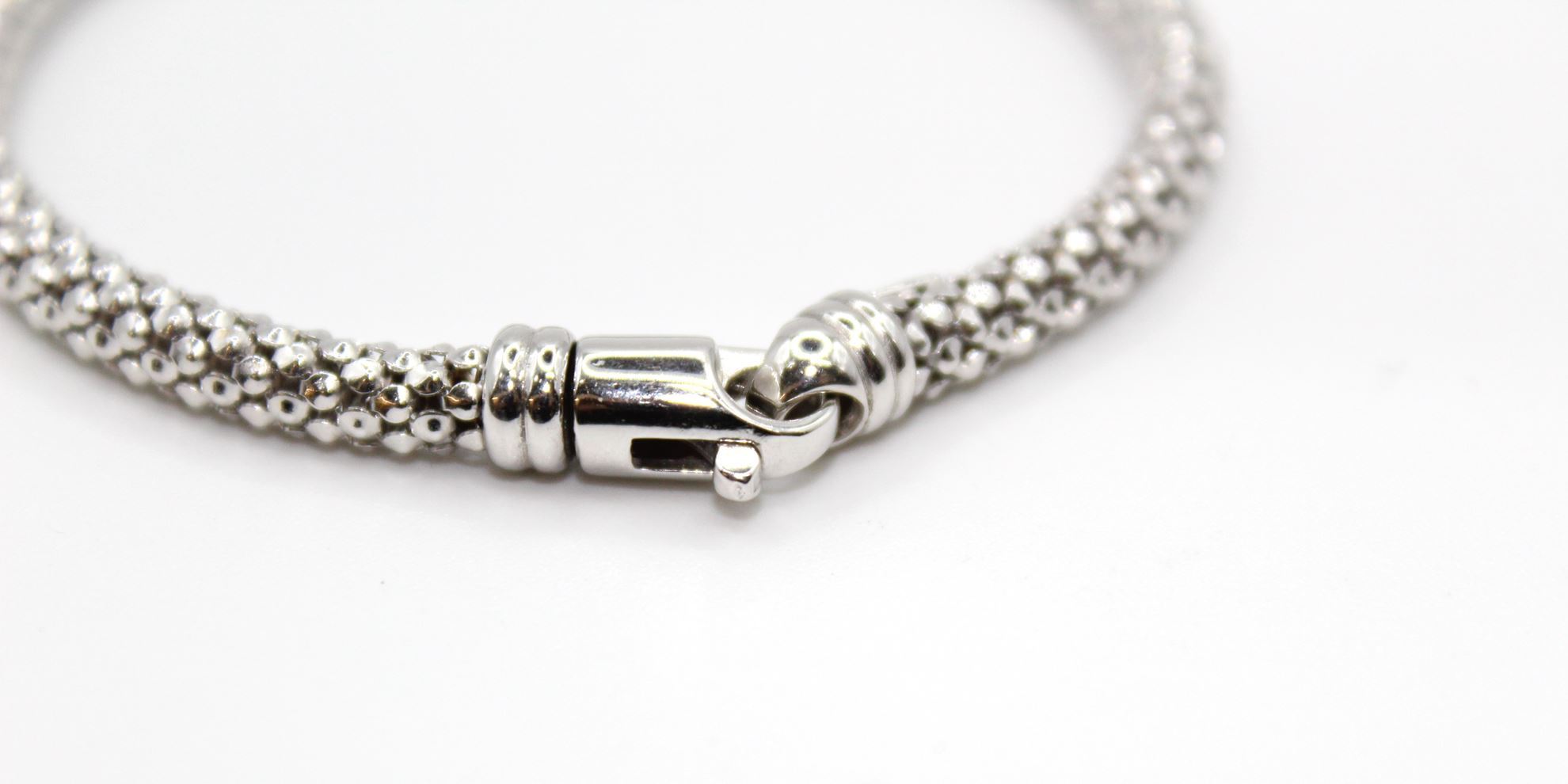 Immagine di Bracciale Fantasia Uomo Donna Oro Bianco