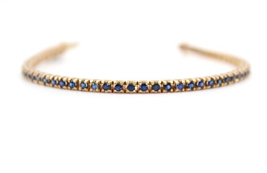 Immagine di Bracciale Tennis in Oro Rosa e Zaffiri